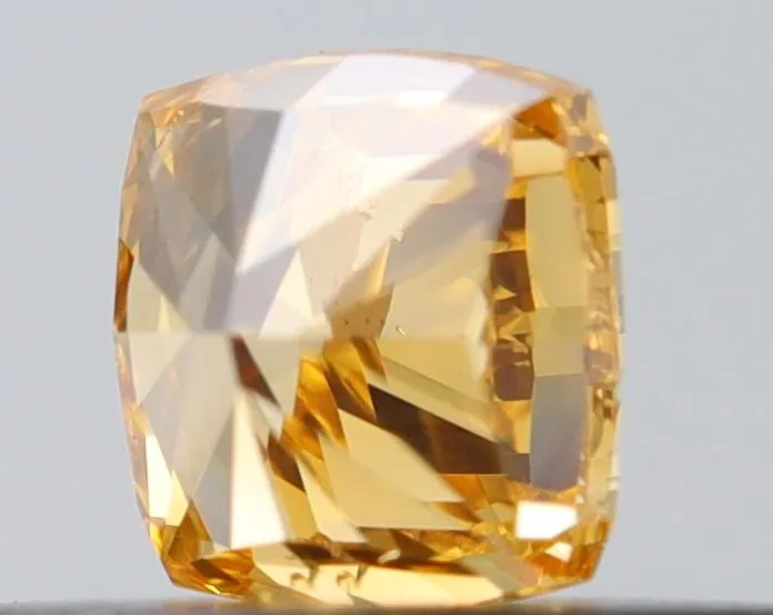 0.25ct Cushion brilliant Natural Diamond (Colour Fancy Vivid Orangey Yellow, Clarity SI1, GIA Certified)