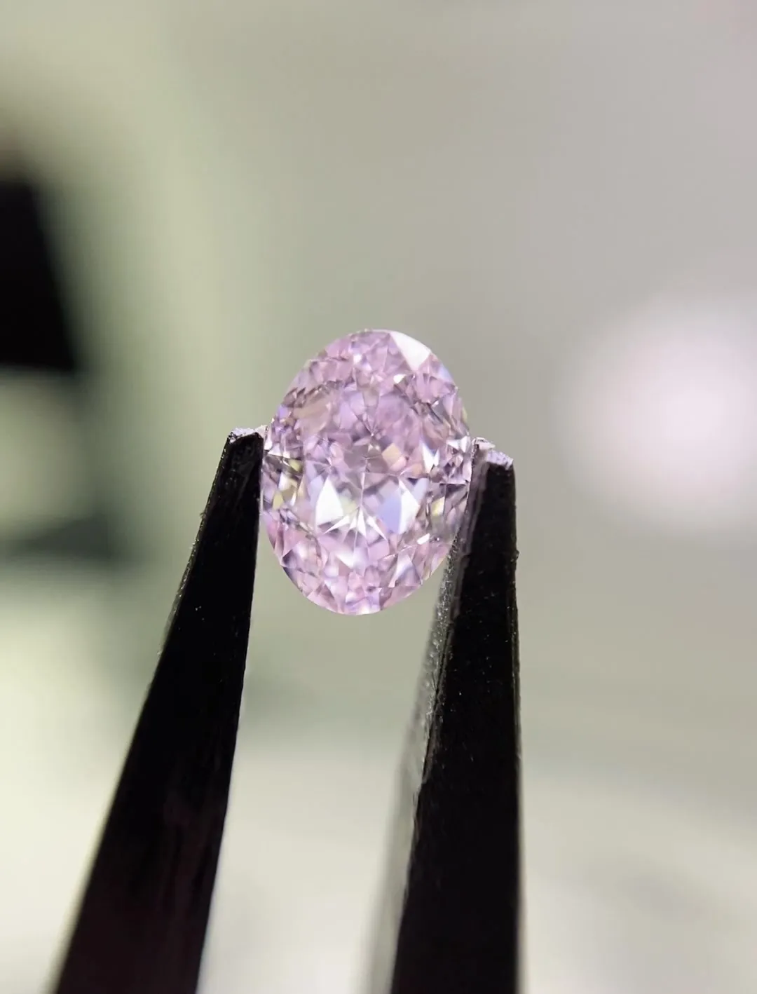 0.54ct Oval Natural Diamond (Colour Fancy Light Purplish Pink, Clarity VS2, GIA Certified)