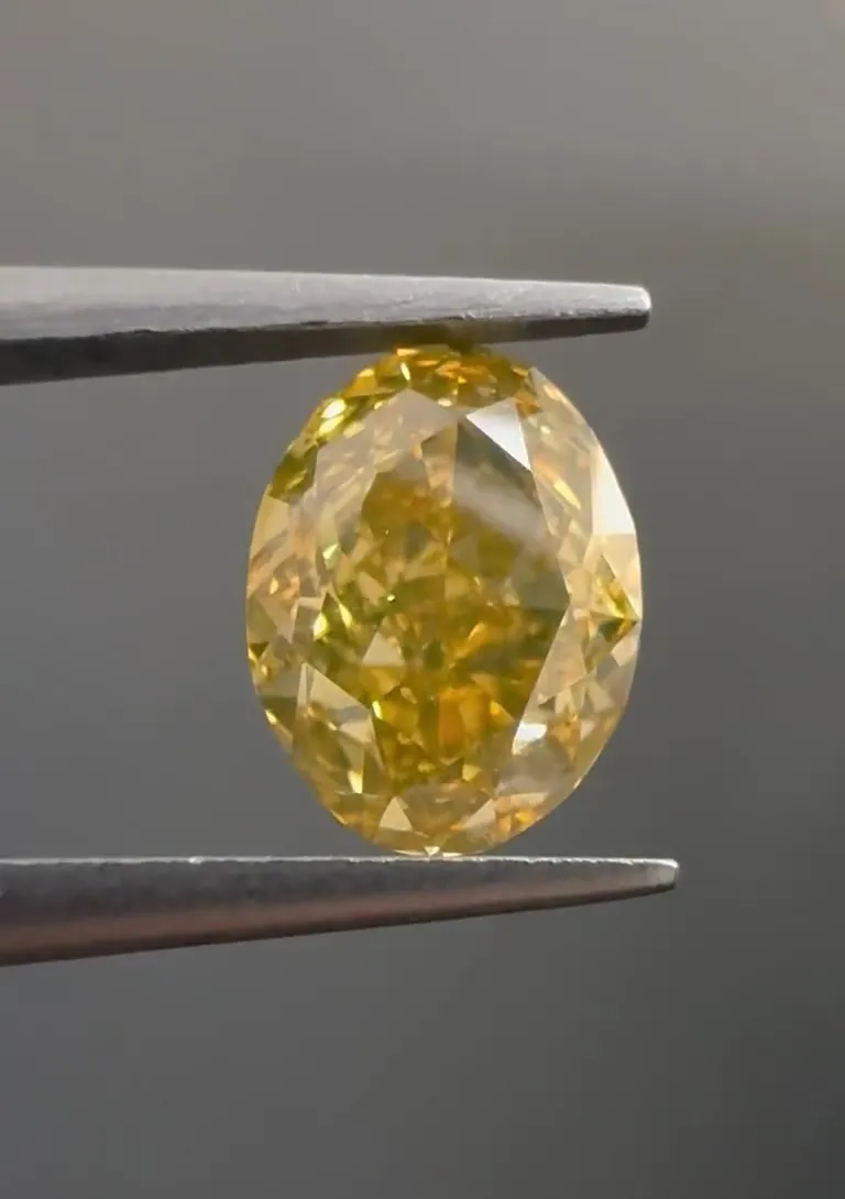 1.02ct Oval Natural Diamond (Colour Fancy Deep Orangey Yellow, Clarity VS2, GIA Certified)